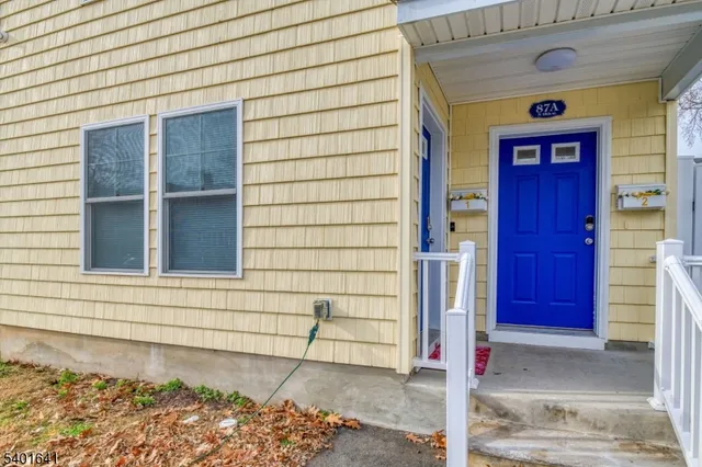 a front view of a house with a garage