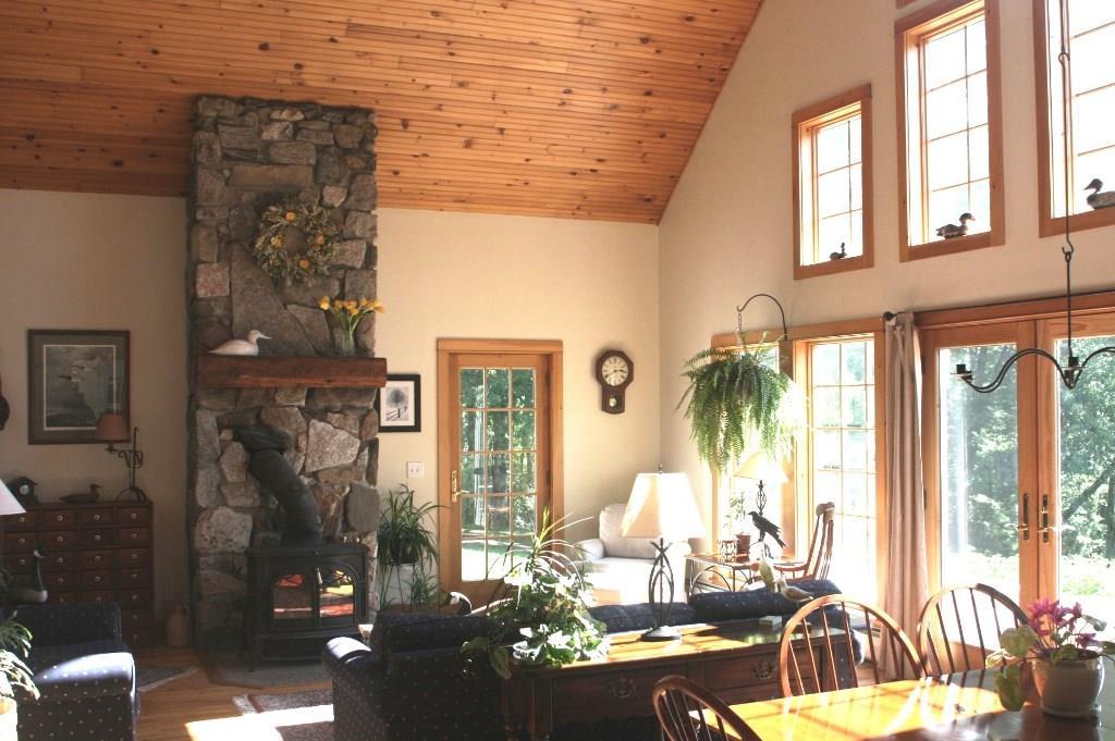 33 Bridge Road Brooksville, ME 04617 - Photo 12 of 35 Attractive stone fireplace with wood...