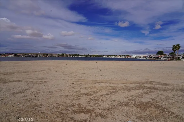 a view of a lake and sunset
