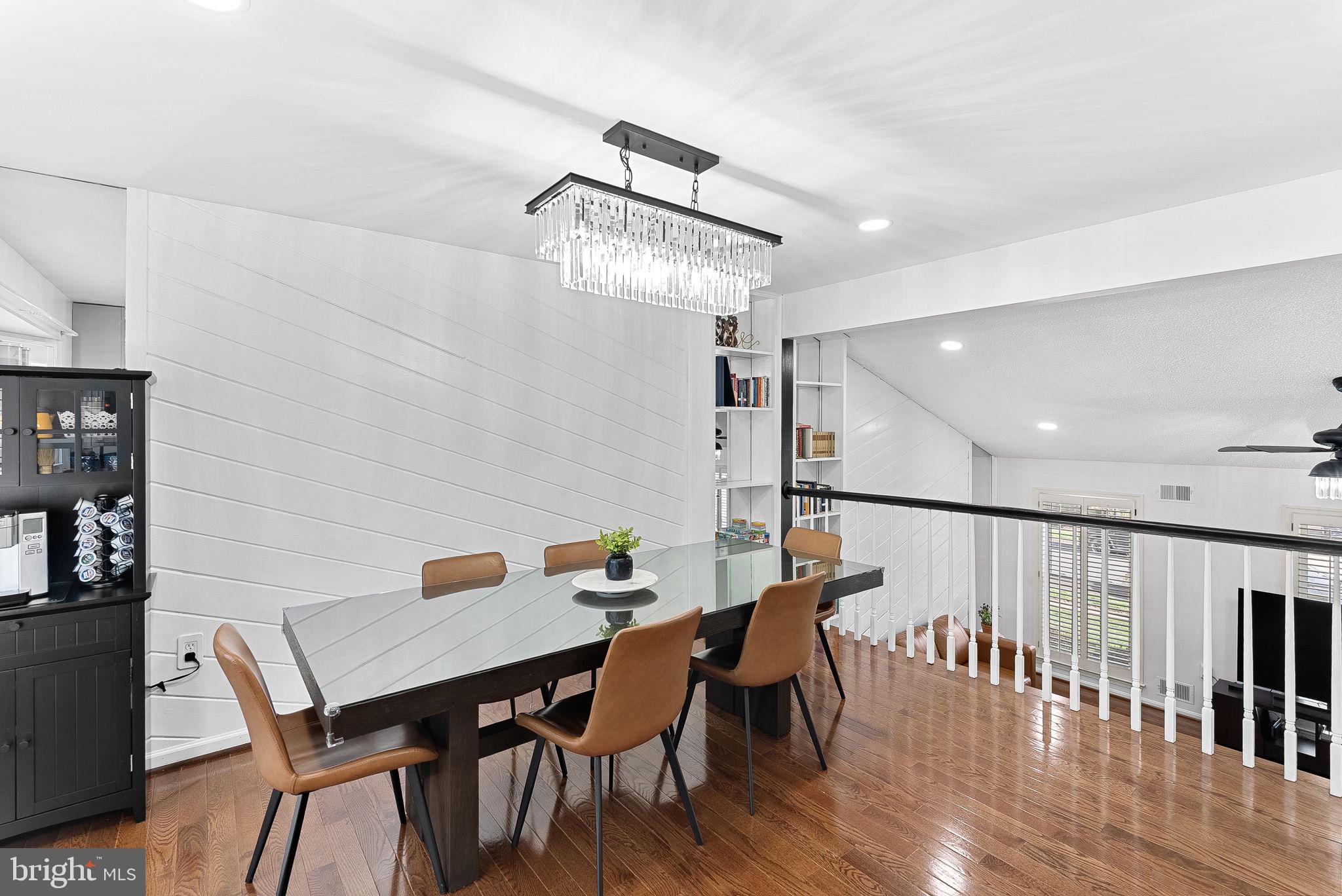 6208 Ormandy Drive Burke, VA 22015 - Photo 12 of 57 a view of a dining room with furniture and wooden floor