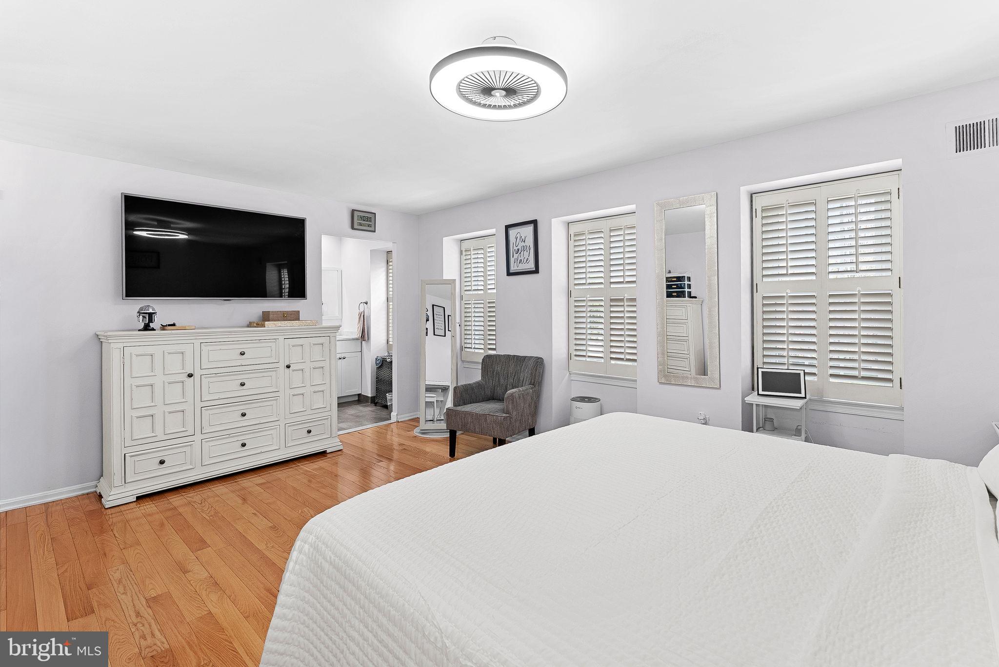 6208 Ormandy Drive Burke, VA 22015 - Photo 22 of 57 a bedroom with furniture and flat screen tv