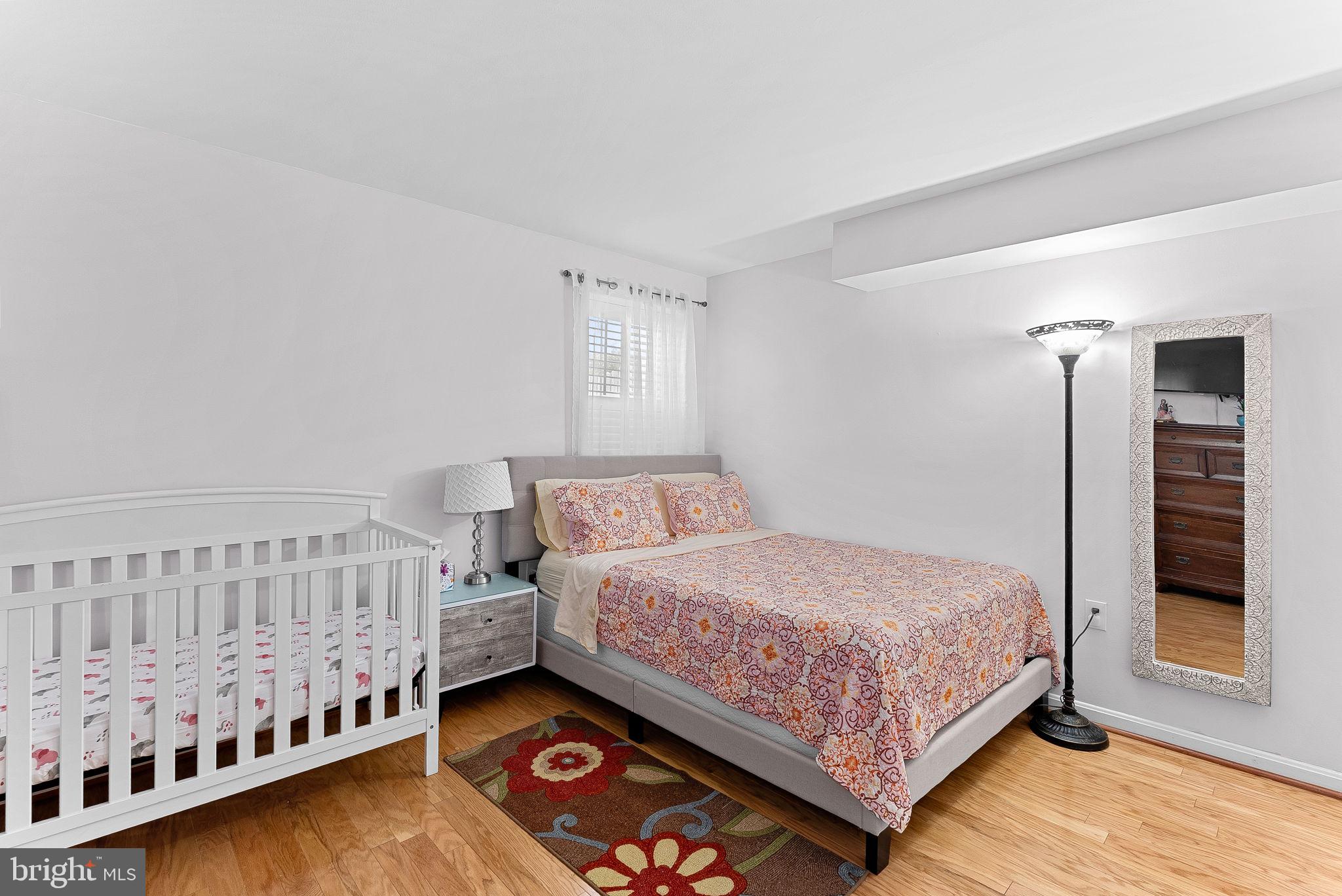 6208 Ormandy Drive Burke, VA 22015 - Photo 37 of 57 a bedroom with a bed and a window