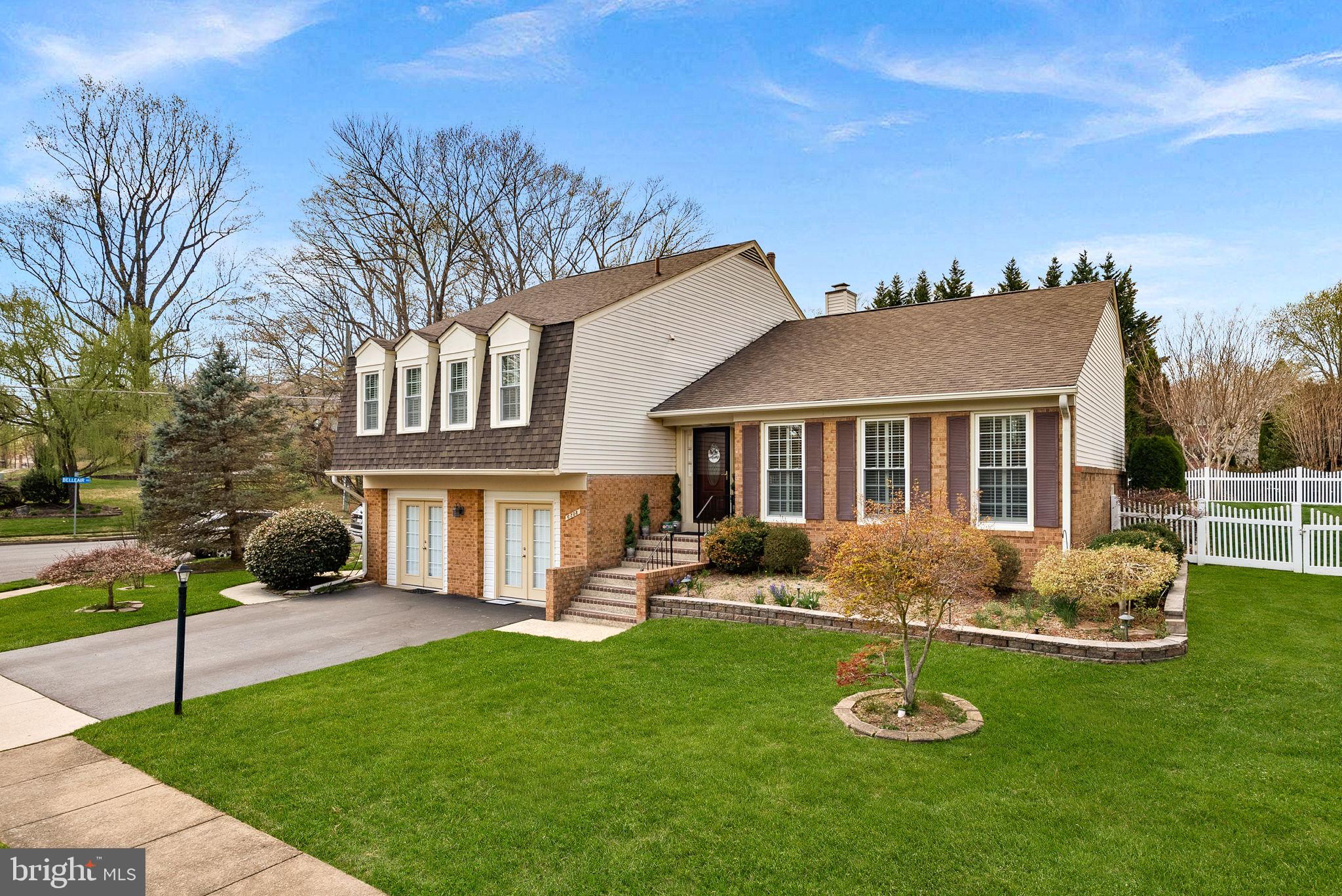 6208 Ormandy Drive Burke, VA 22015 - Photo 4 of 57 a front view of a house with patio