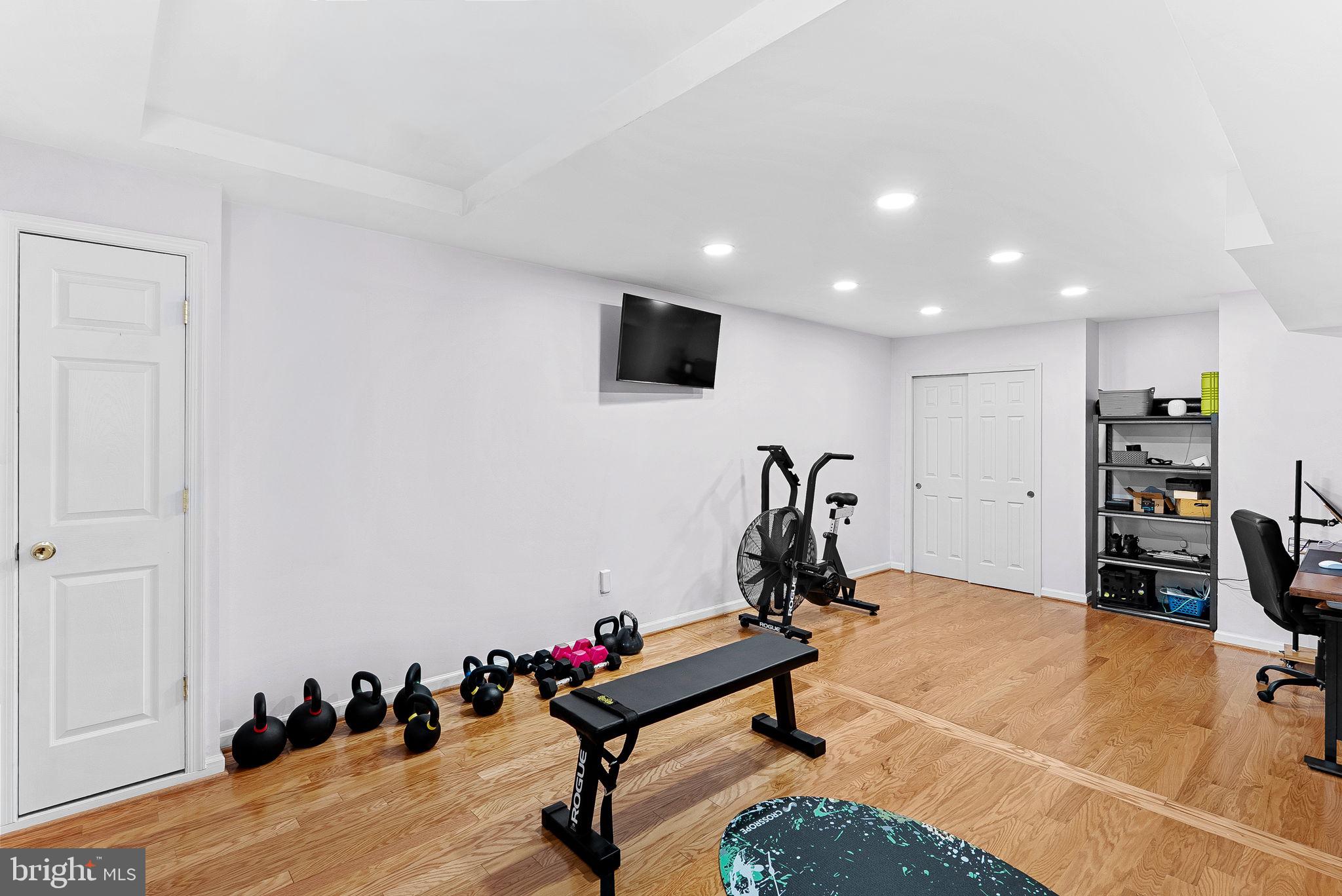 6208 Ormandy Drive Burke, VA 22015 - Photo 44 of 57 a view of a room with gym equipment