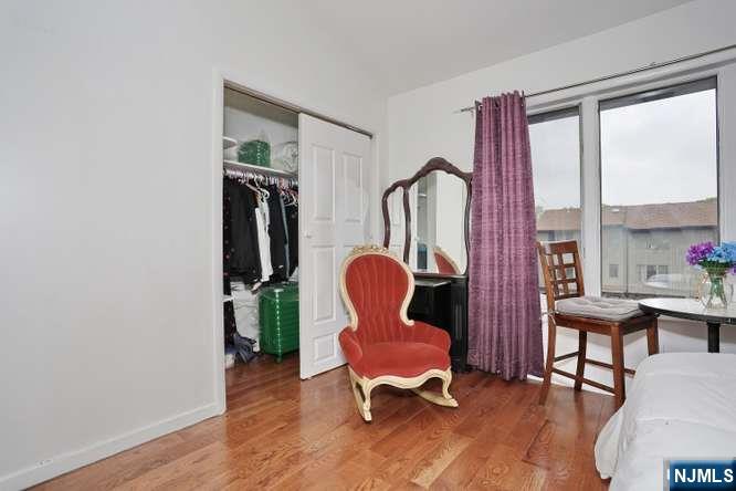 290 Hamilton Place, Unit 4 Hackensack, NJ 07601 - Photo 24 of 50 a view of a workspace with furniture and a window