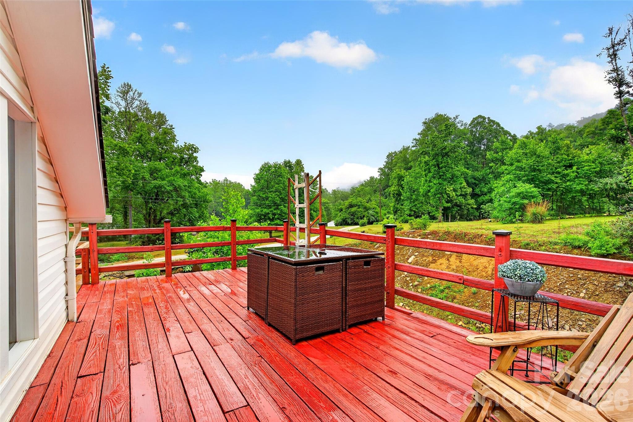 227 Locust Cove Road Marion, NC 28752 - Photo 26 of 34 a view of deck with wooden floor and seating space