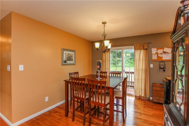 1025 Heatherwood Road Pleasant View, TN 37146 - Photo 5 of 20 Gleaming floors in the dining area-sliding doors out to deck & patio.