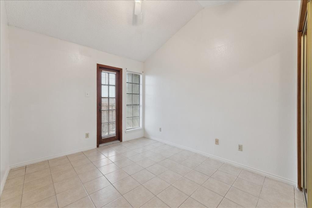 6108 Abrams Road, Unit 330 Dallas, TX 75231 - Photo 16 of 18 an empty room with an entryway