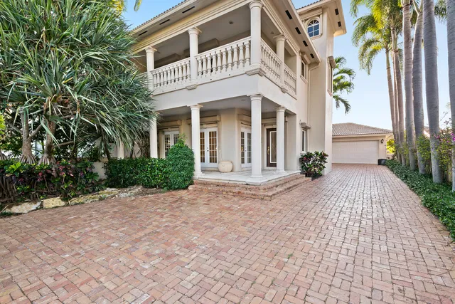 a view of a building with a yard