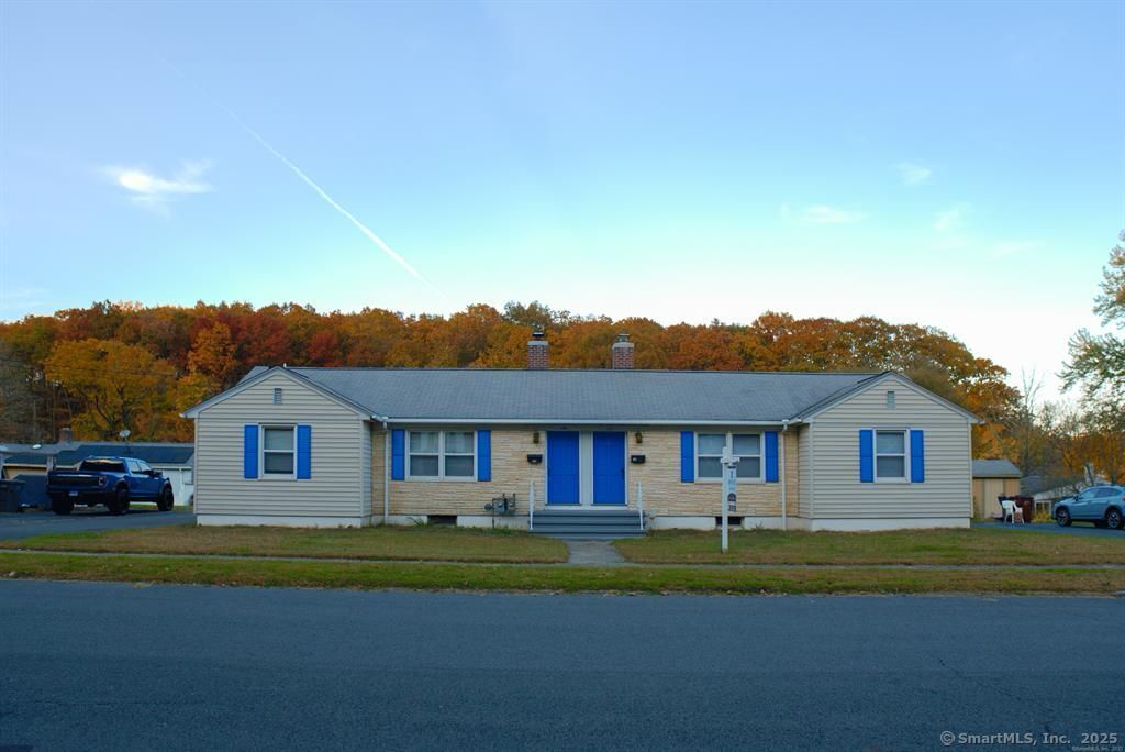111 Irving Left Side Street Naugatuck, CT 06770 - Photo 1 of 11 a front view of a house with a yard