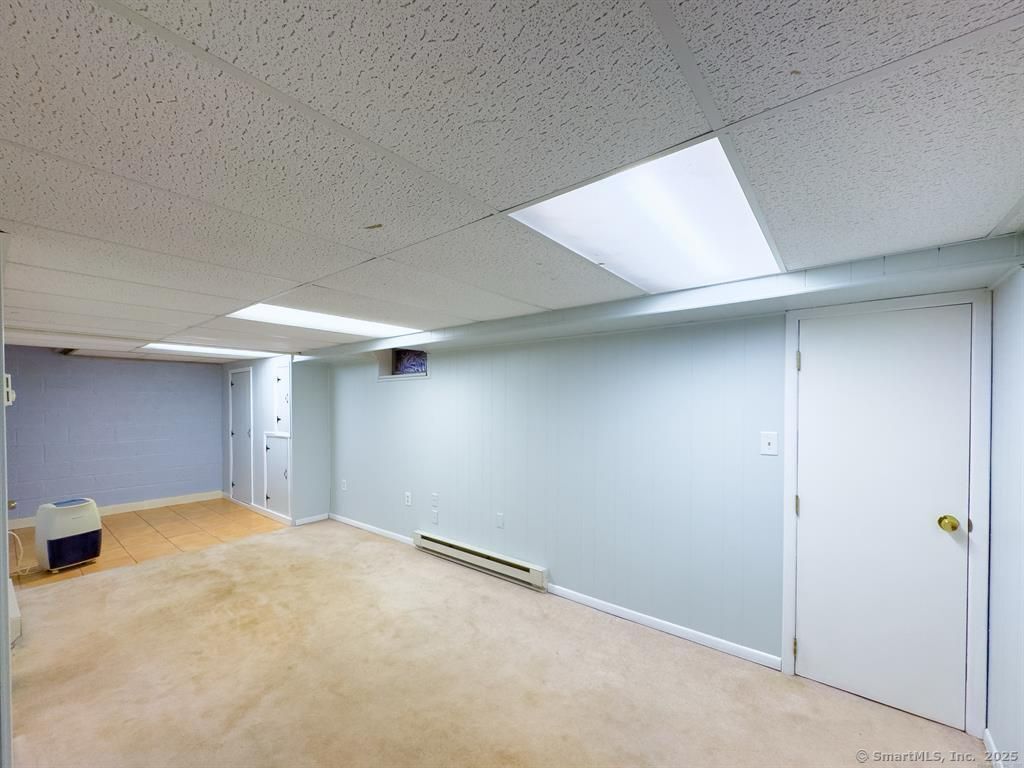 111 Irving Left Side Street Naugatuck, CT 06770 - Photo 10 of 11 en empty room with windows