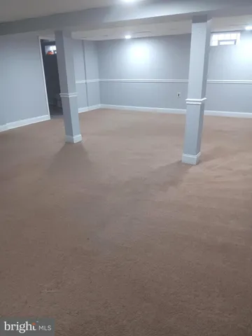 a view of a wooden floor with a yard