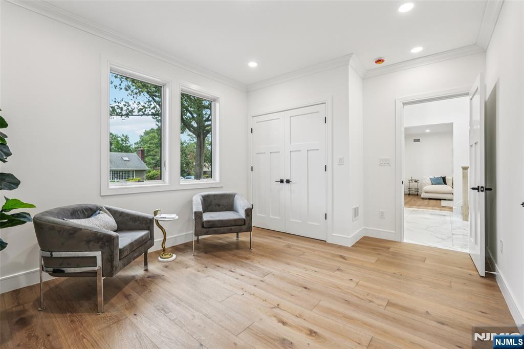 492 Oaktree Road Oradell, NJ 07649 - Photo 11 of 43 a view of a livingroom with furniture window and wooden floor