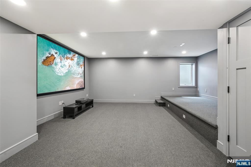 492 Oaktree Road Oradell, NJ 07649 - Photo 32 of 43 an empty room with windows