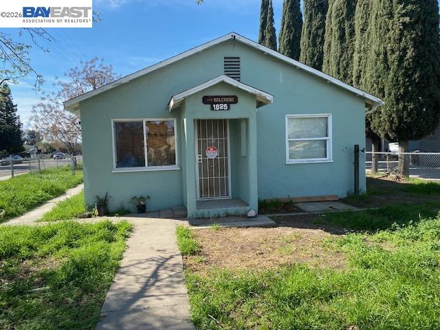 1825 Eureka Street Modesto, CA 95358 - Photo 1 of 1 a front view of a house with garden