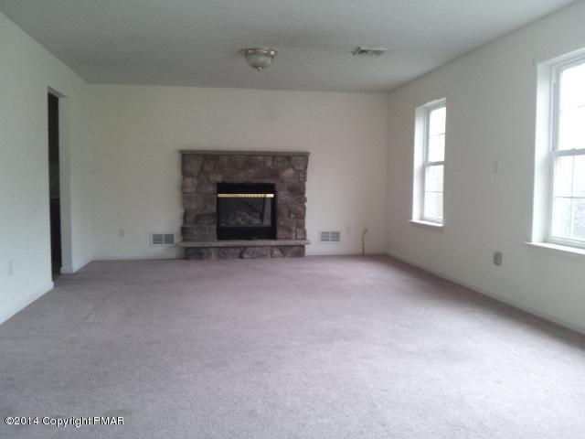 1159 Clover Road Long Pond, PA 18334 - Photo 2 of 19 Living room w/fireplace