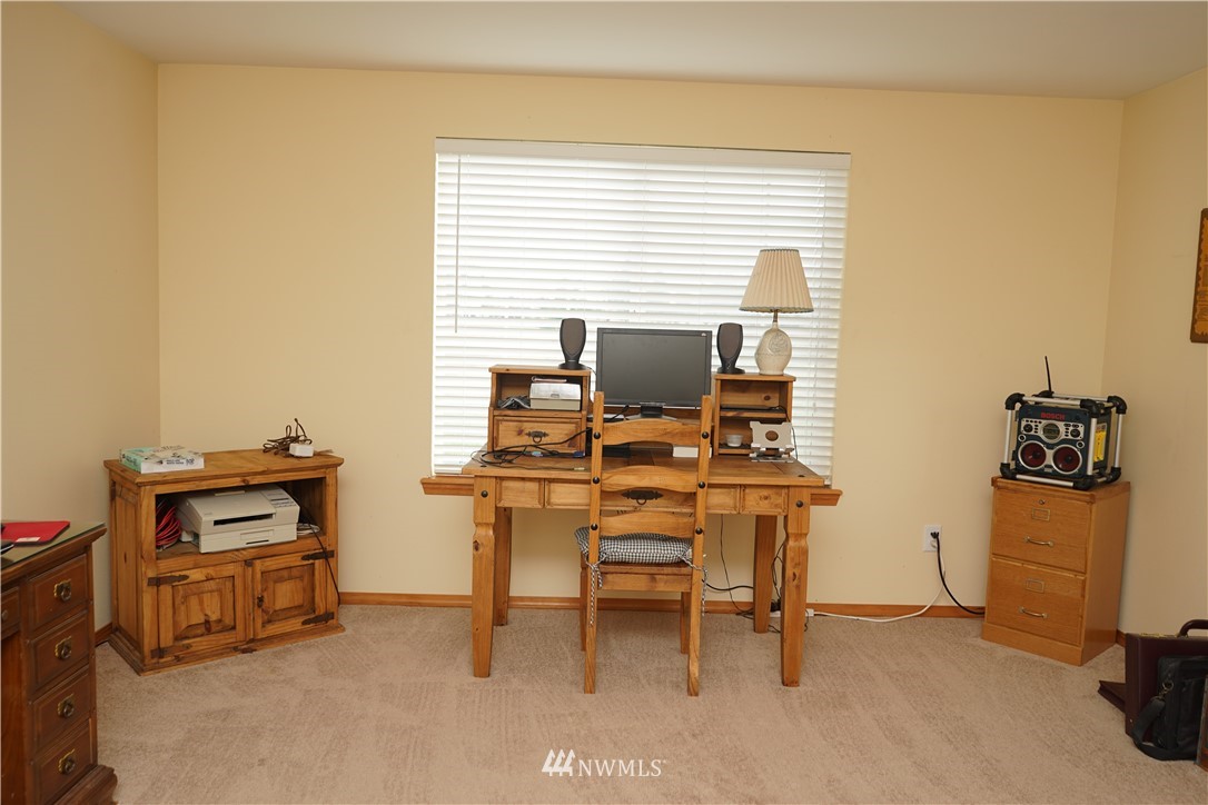 16823 Leitner Road Southwest Rochester, WA 98579 - Photo 18 of 31 a view of a workspace with furniture