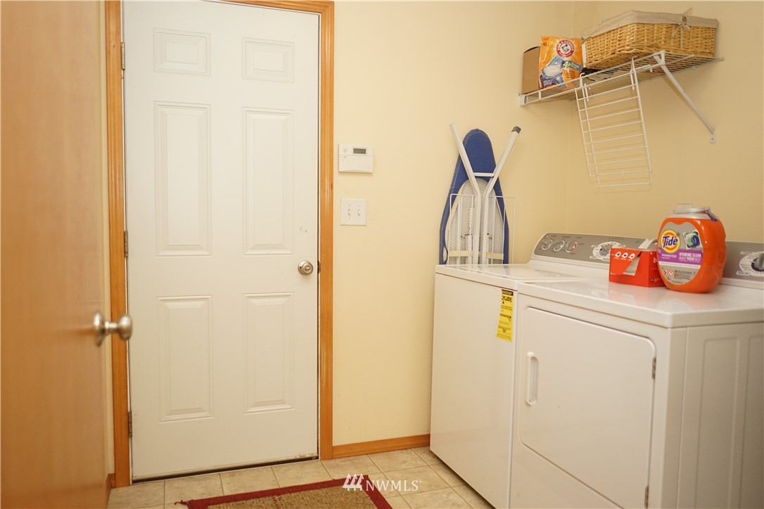16823 Leitner Road Southwest Rochester, WA 98579 - Photo 21 of 31 a utility room with dryer and washer