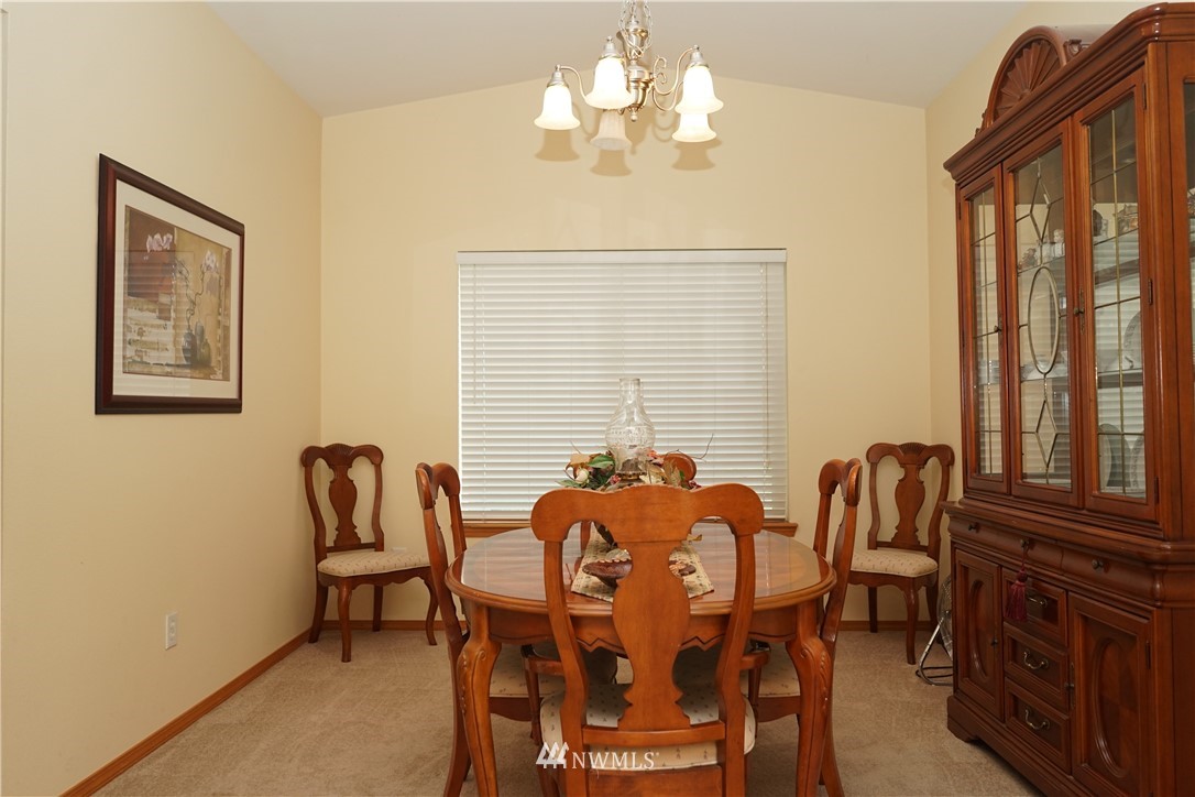 16823 Leitner Road Southwest Rochester, WA 98579 - Photo 10 of 31 a dining room with furniture and window