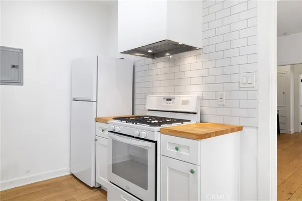 a utility room with washer and dryer