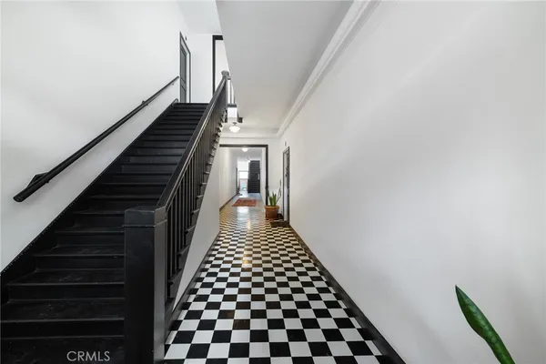 a view of a hallway view with staircase