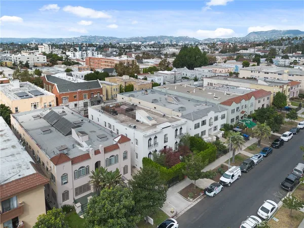 an aerial view of residential building with parking space