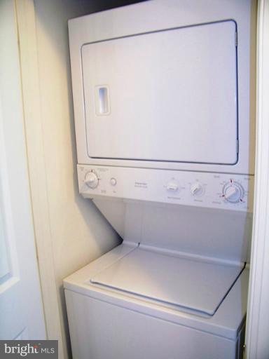 14642 Solomons Island Road South, Unit 2 Solomons, MD 20688 - Photo 3 of 14 a close up view of washer and dryer