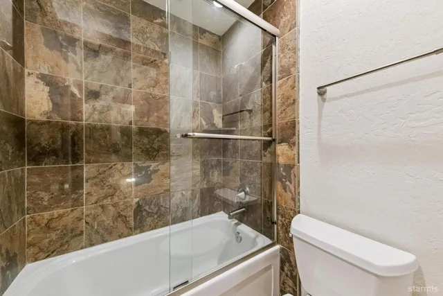 a bathroom with a sink and toilet