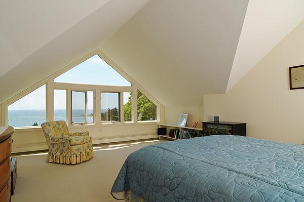 48 Bourne Point Road Wareham, MA 02571 - Photo 16 of 23 a bed room with a bed and a large window