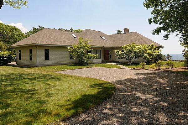 48 Bourne Point Road Wareham, MA 02571 - Photo 19 of 23 a front view of a house with a yard