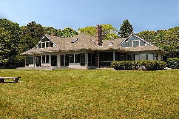48 Bourne Point Road Wareham, MA 02571 - Photo 2 of 23 a front view of a house with swimming pool