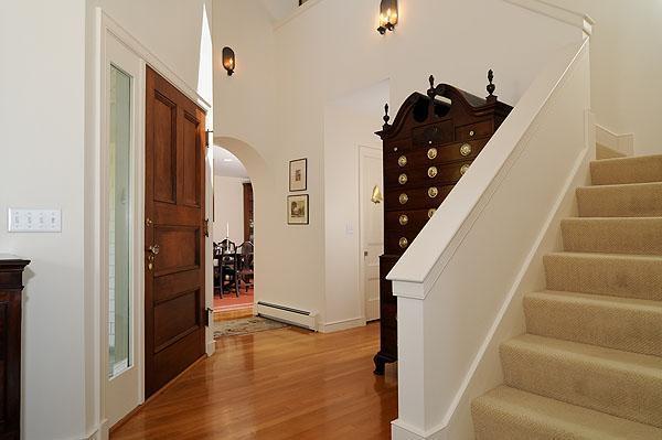 48 Bourne Point Road Wareham, MA 02571 - Photo 4 of 23 a view of entryway and hall with wooden floor