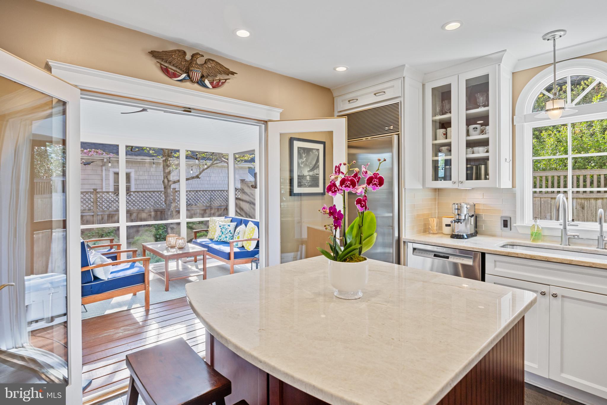 326 State Street Annapolis, MD 21403 - Photo 8 of 39 Kitchen Opens Up to Screened Porch