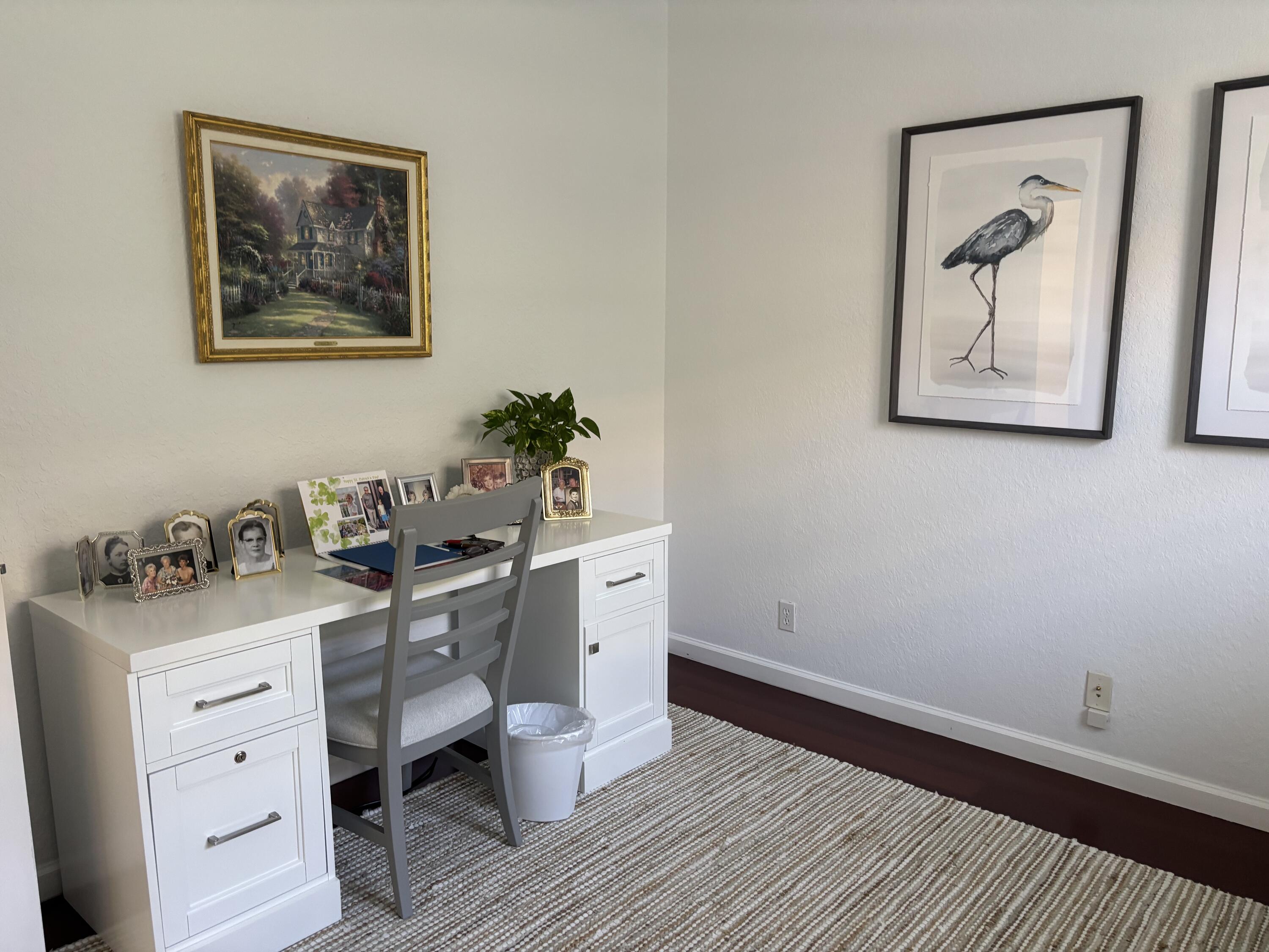 140 Via Rosina Jupiter, FL 33458 - Photo 14 of 16 a view of a workspace with furniture and wooden floor