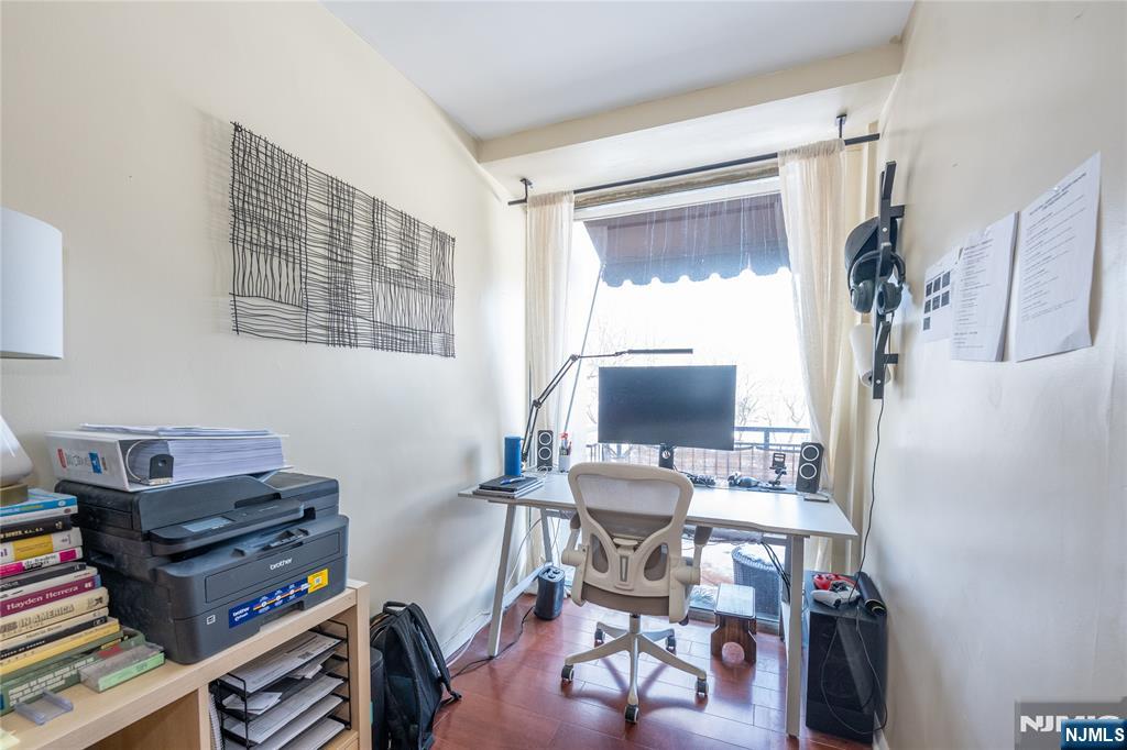 1 Horizon Road, Unit 403 Fort Lee, NJ 07024 - Photo 13 of 29 a view of a workspace with furniture and a window