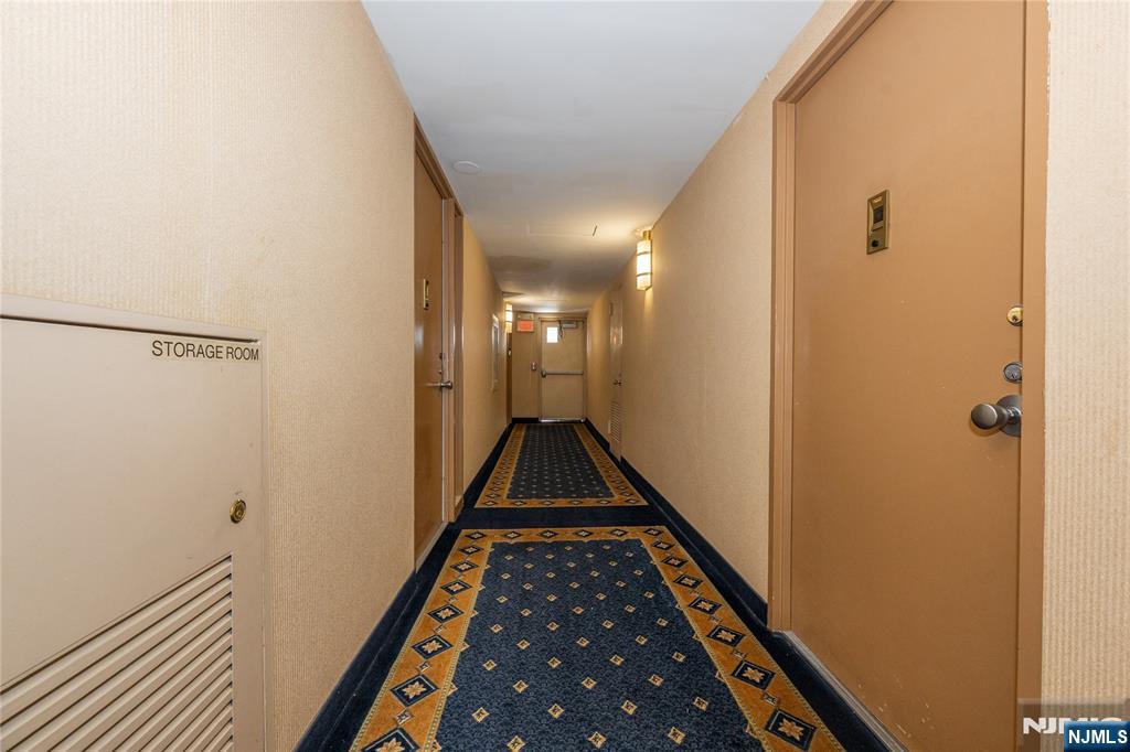 1 Horizon Road, Unit 403 Fort Lee, NJ 07024 - Photo 18 of 29 a view of hallway with wooden floor