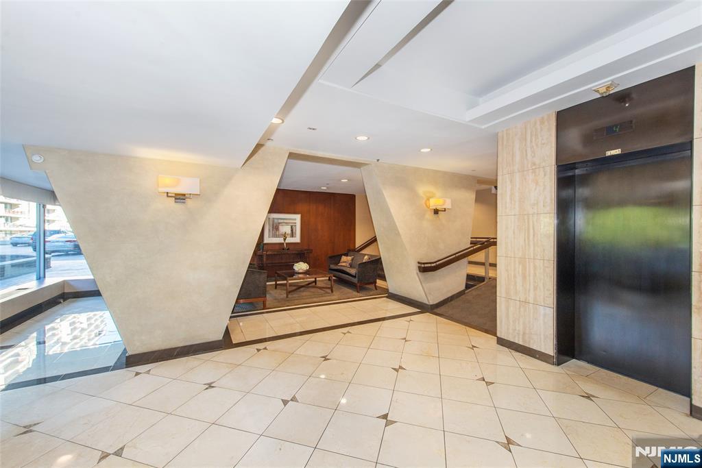 1 Horizon Road, Unit 403 Fort Lee, NJ 07024 - Photo 22 of 29 a view of an entryway with wooden floor