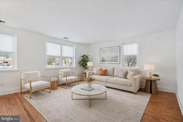 a living room with furniture and a couch