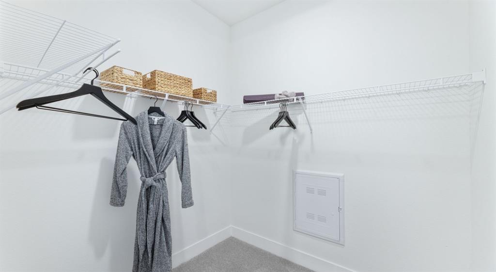 3800 West Lamberth Road, Unit 204 Sherman, TX 75092 - Photo 10 of 15 a view of walk in closet with clothes