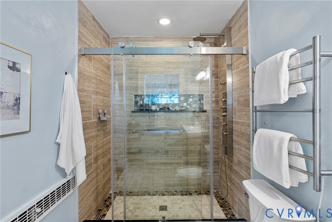 803 Spottswood Road Richmond, VA 23220 - Photo 17 of 50 a bathroom with a shower and a sink