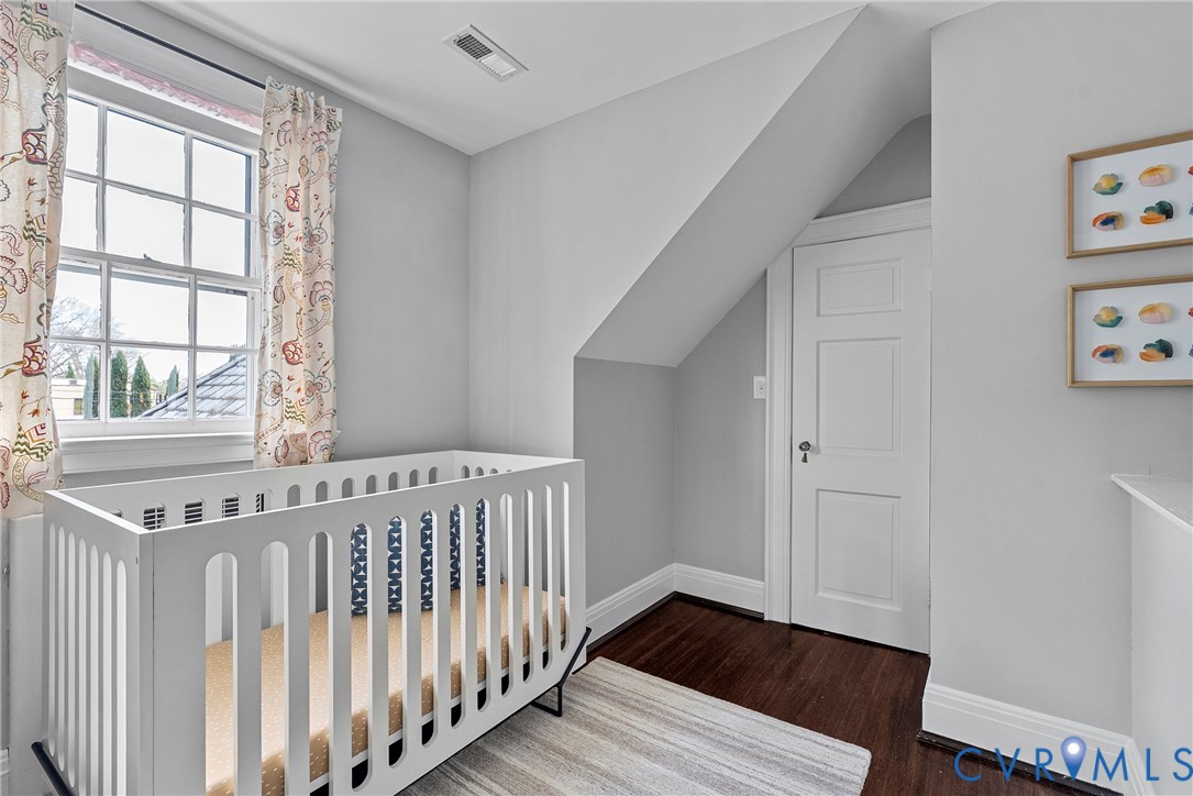 803 Spottswood Road Richmond, VA 23220 - Photo 25 of 50 a view of a room with wooden floor and windows