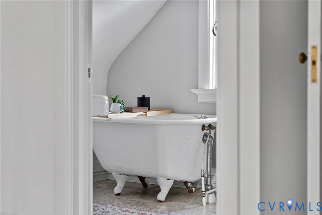 803 Spottswood Road Richmond, VA 23220 - Photo 34 of 50 a bathroom with a sink and a mirror