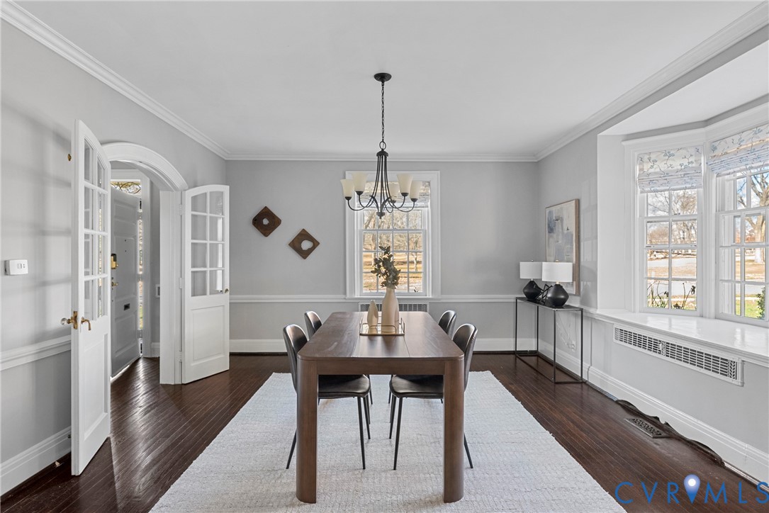 803 Spottswood Road Richmond, VA 23220 - Photo 8 of 50 a view of a dining room with furniture window and wooden floor