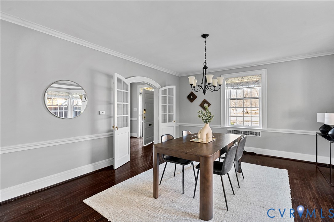 803 Spottswood Road Richmond, VA 23220 - Photo 10 of 50 a view of a dining room with furniture window and wooden floor