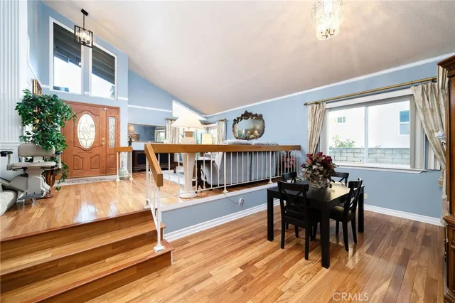 a living room with furniture a rug and a fireplace