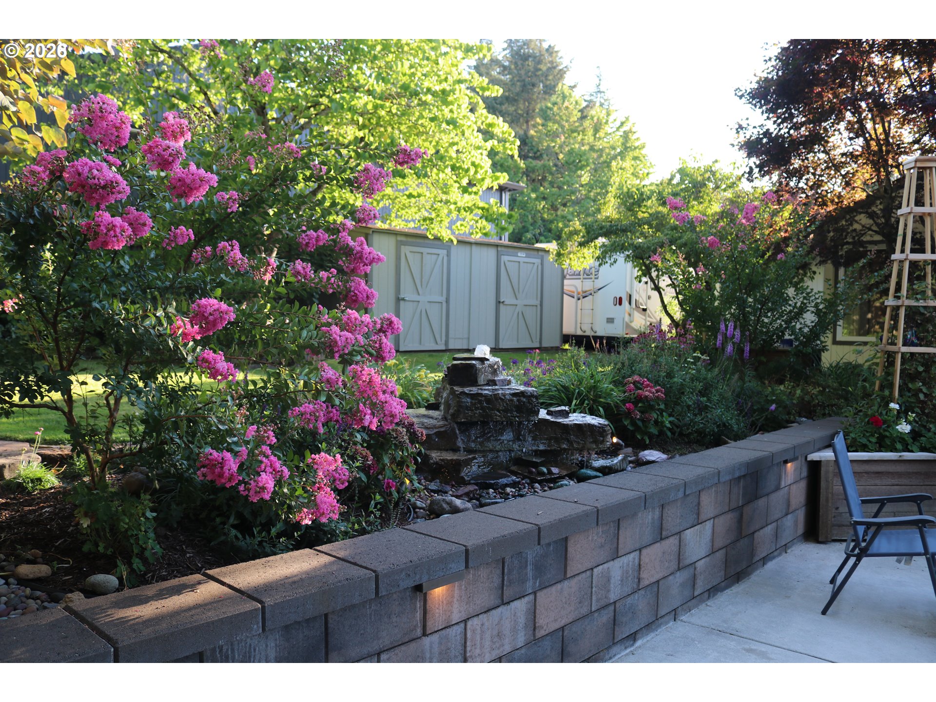 7680 Southwest 182nd Place Beaverton, OR 97007 - Photo 33 of 33 a view of flower garden with wooden fence