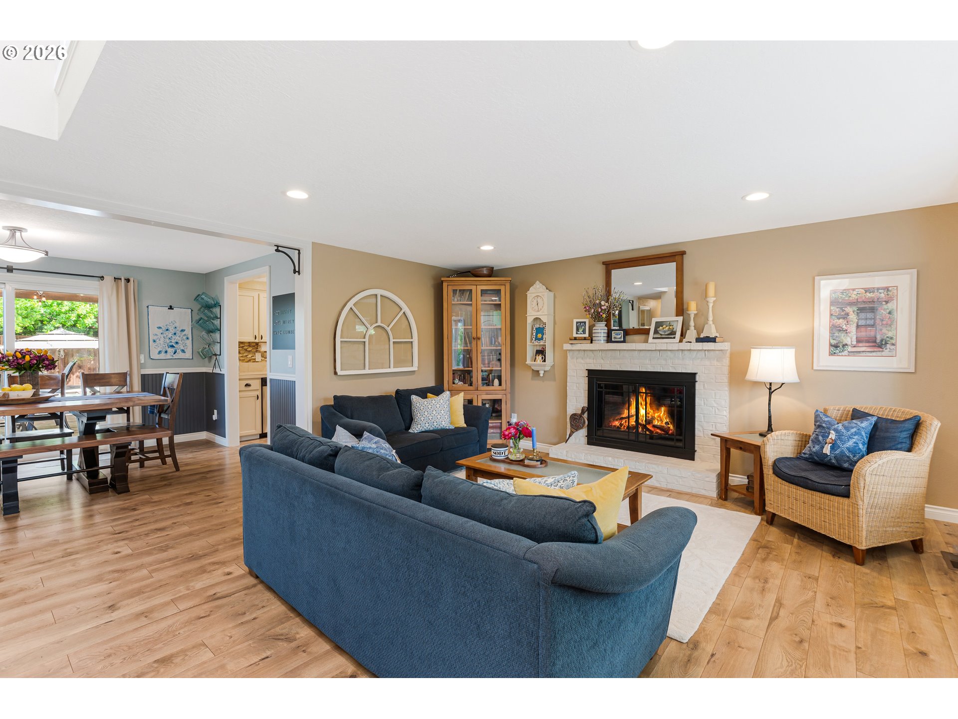 7680 Southwest 182nd Place Beaverton, OR 97007 - Photo 5 of 33 a living room with furniture and a fireplace