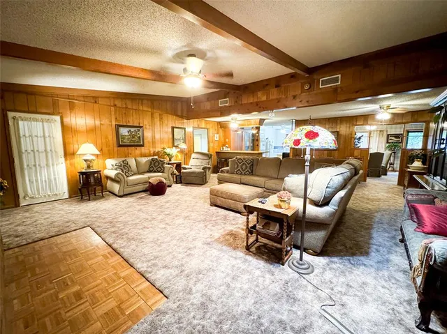 a outdoor space with lots of tables and chairs