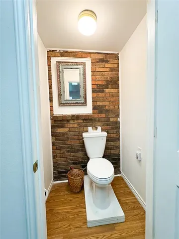 a bathroom with a toilet and a sink
