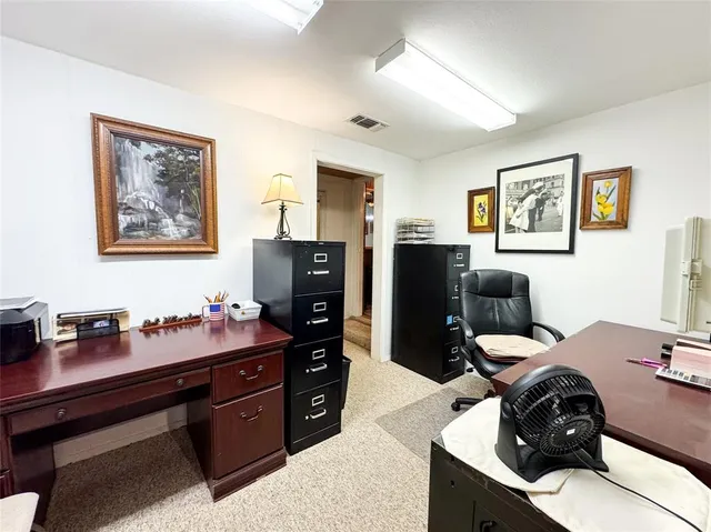 a bedroom with a bed and furniture